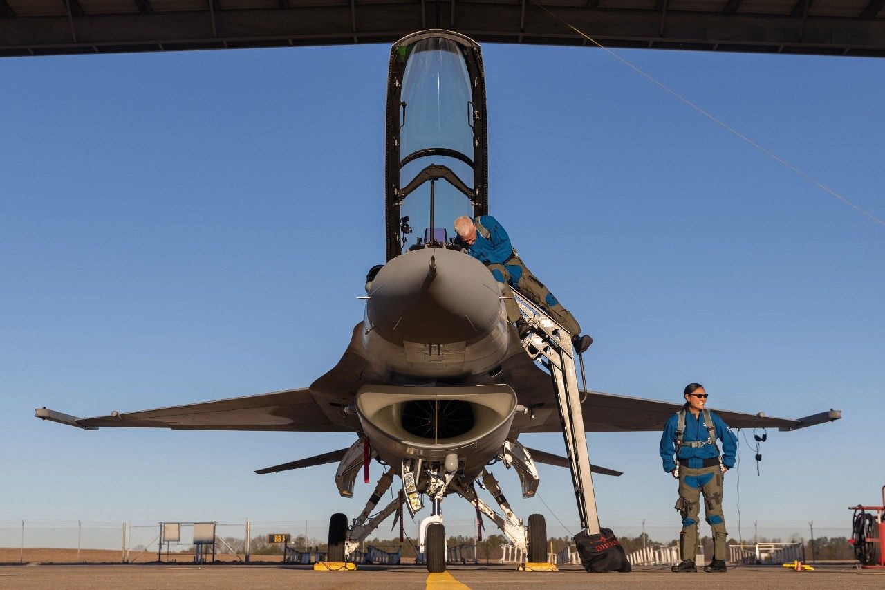 Monessa “Siren” Balzhiser, Lockheed Martin pilot, with the F-16 Block 