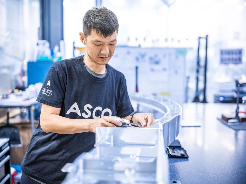 ASCO employee at work on the manufacturing floor
