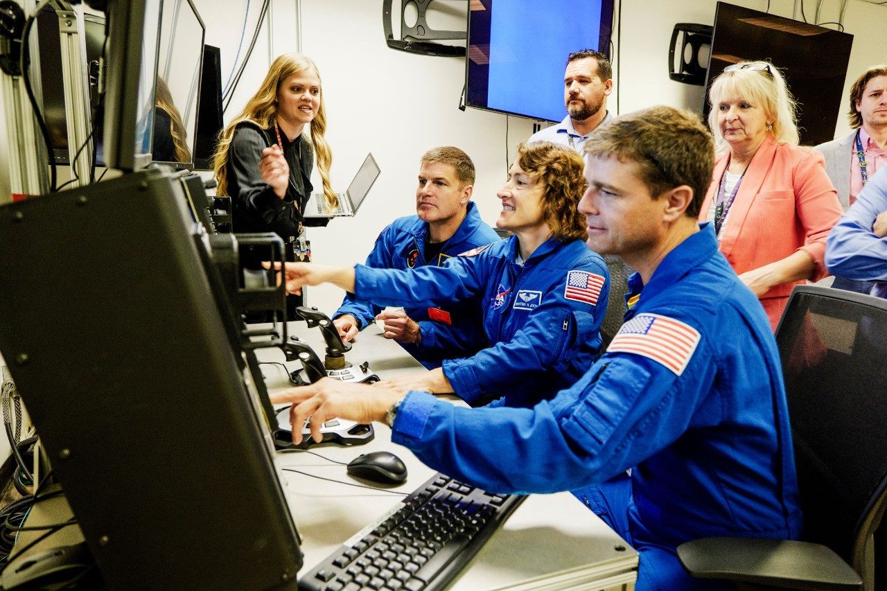 Artemis II crew working with Lockheed Martin engineer