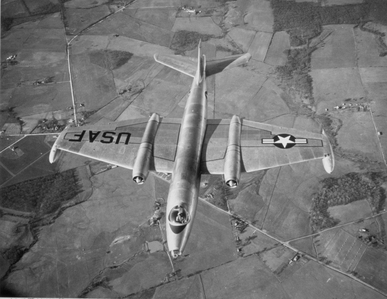 The sixth B-57A Canberra in flight with wingtip fuel tanks. Other than using American-built engines and US Air Force instruments and systems, the B-57As differed little from the Royal Air Force (RAF) Canberras.