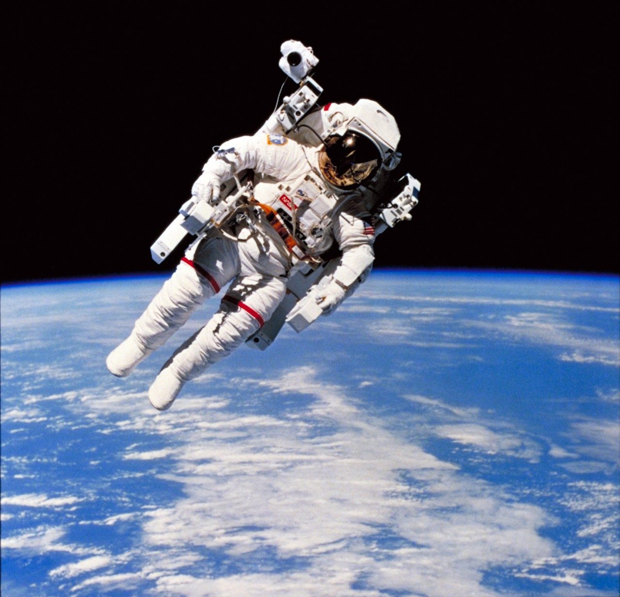 Manned Maneuvering Unit (MMU), a personal backpack propulsion system astronauts wear when working in orbit outside the Space Shuttle.