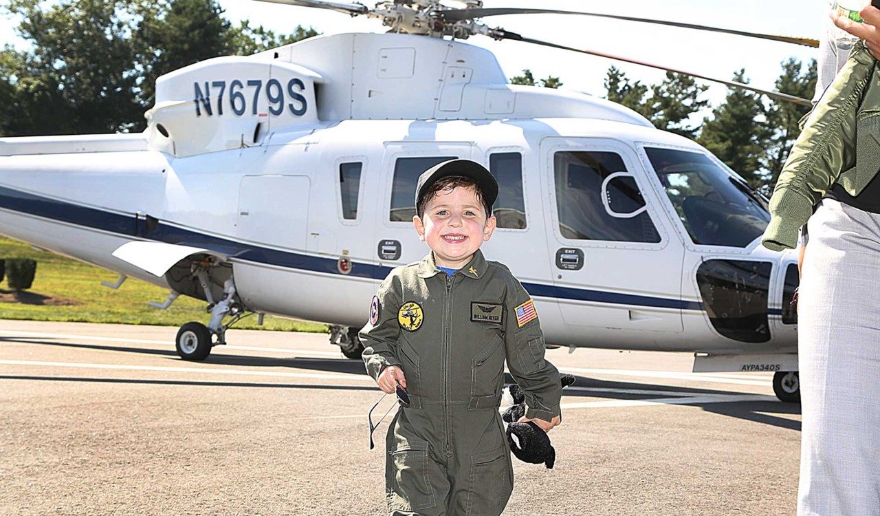 William in front of S-76 helicopter