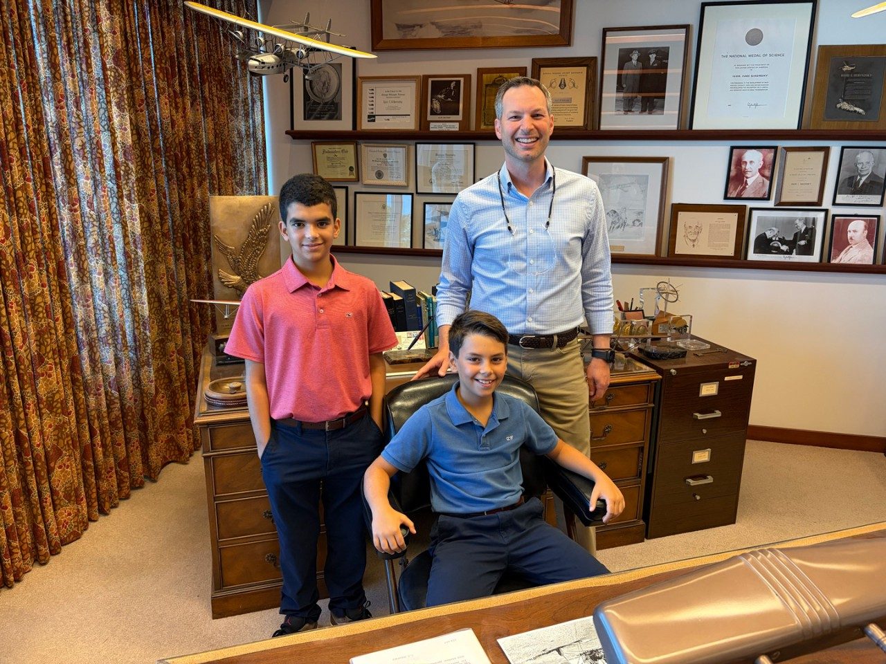 Evan Waldman, CEO of Essex Industries, and his sons Parker and Sawyer visit the Sikorsky offices in Stratford, Conn., Aug. 20, 2026. 
