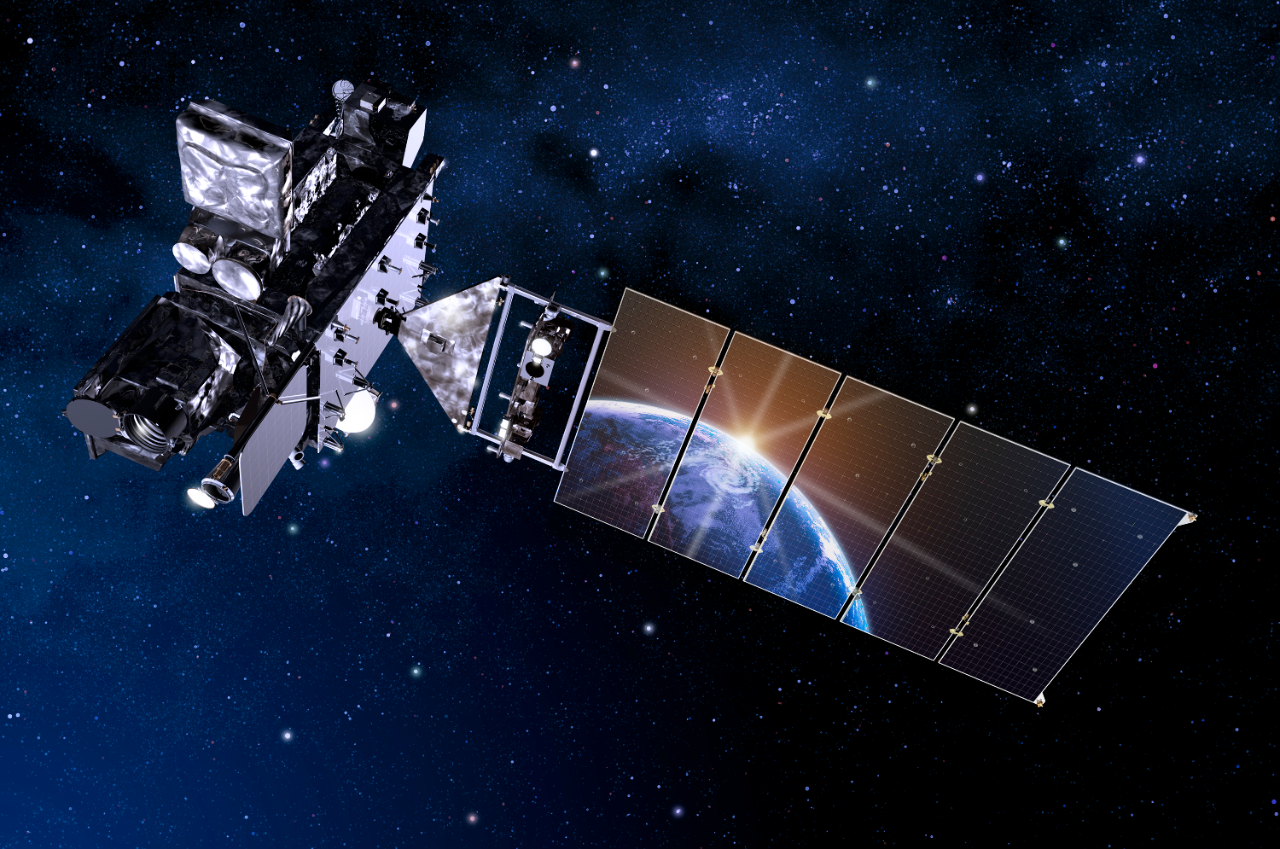 GOES-R satellite render with solar array deployed reflecting the Earth