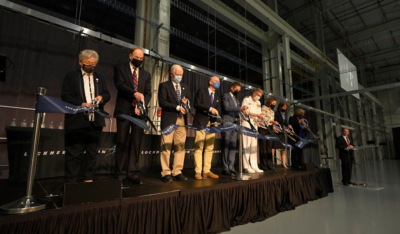 Ribbon cutting marks the opening of new missile assembly building in Courtland, Alabama.