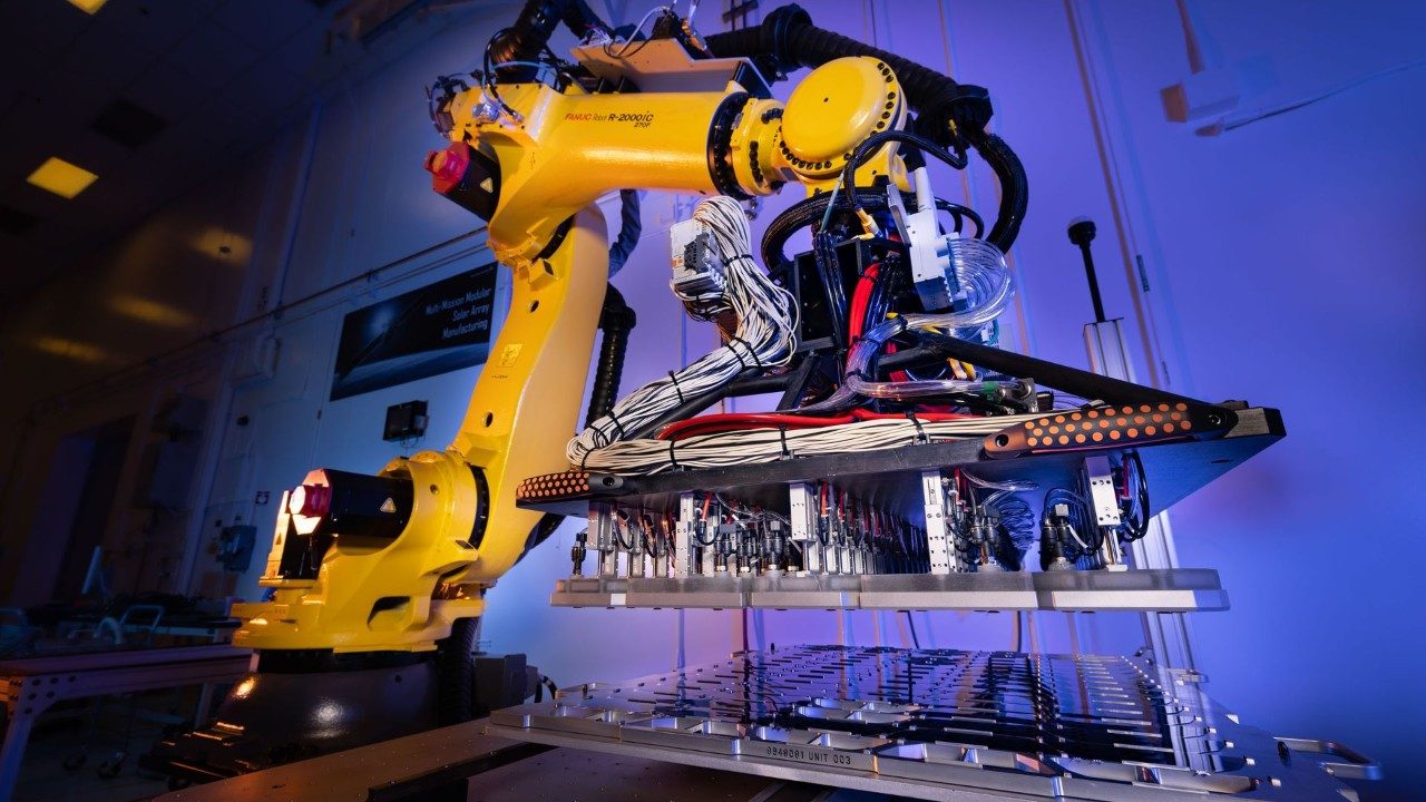 Small Satellite Processing & Delivery center automated solar array manufaturing arm